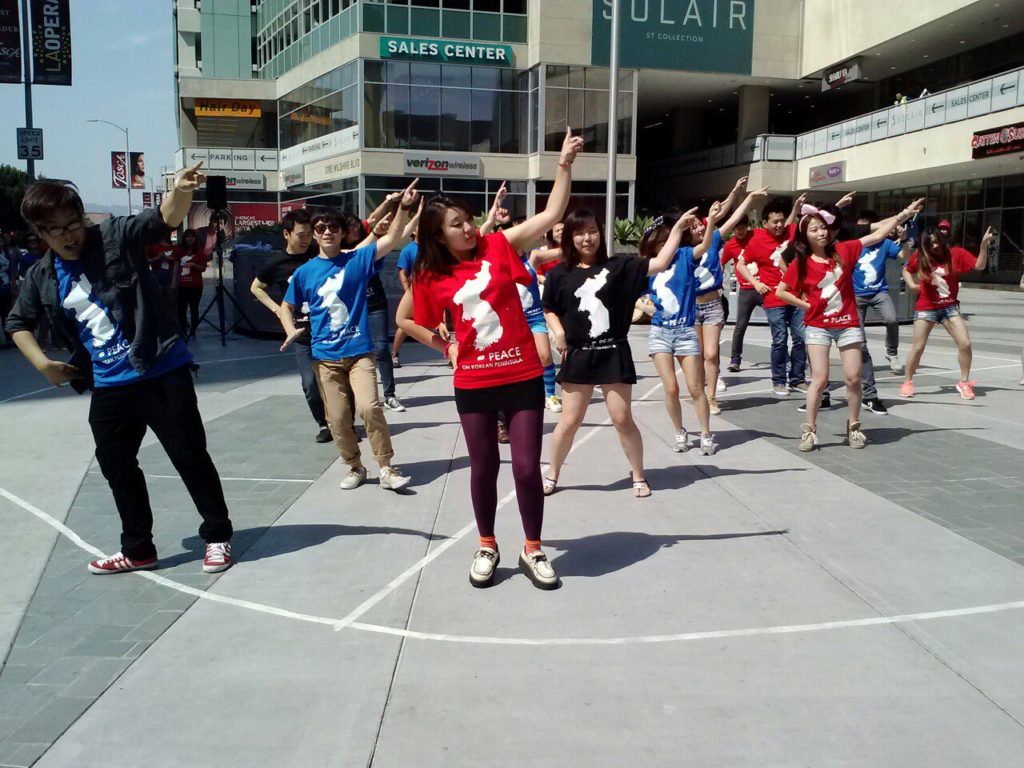 Students dance to the Korean traditional song Arirang during the flash mob.