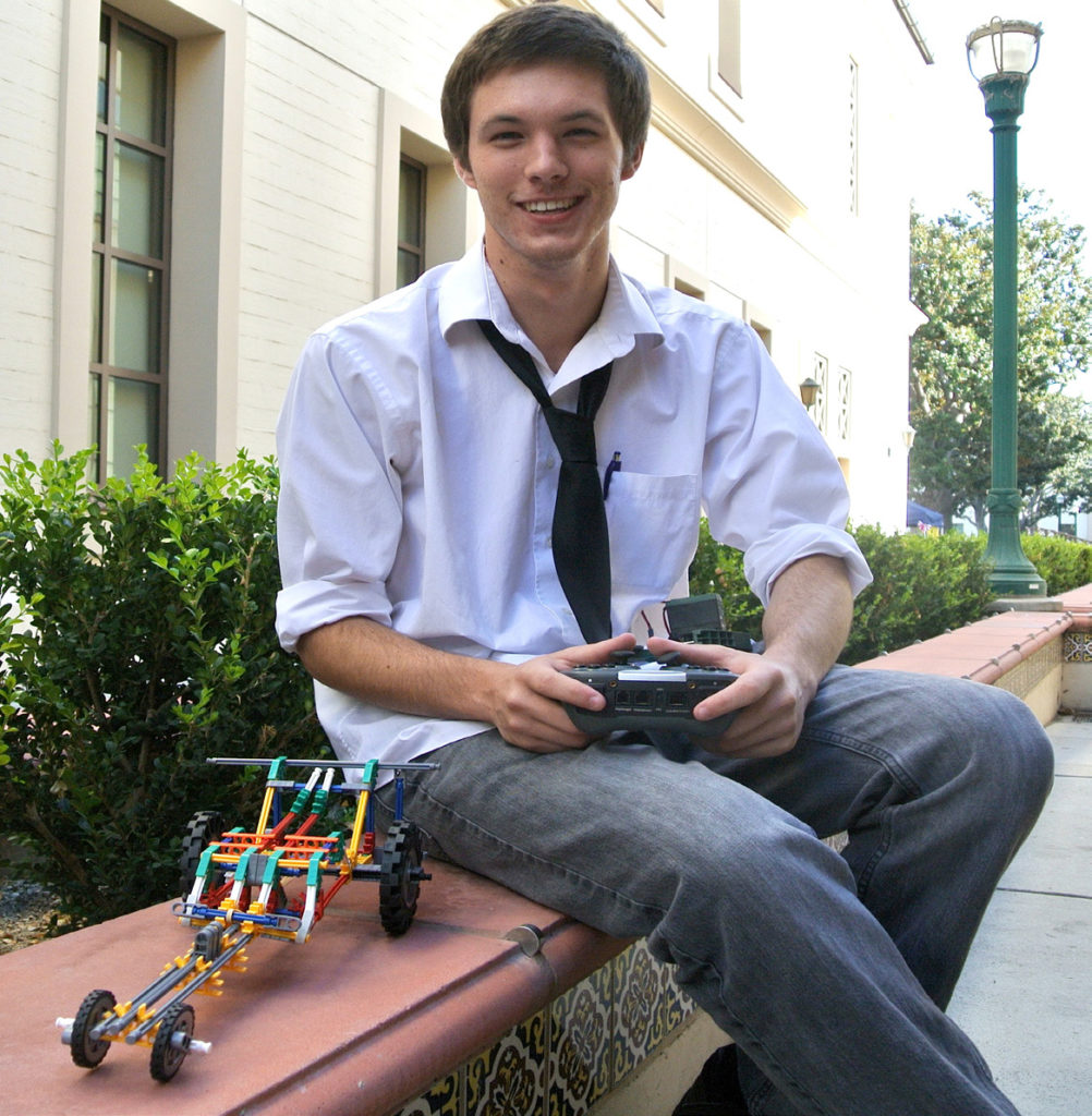 Joey Victor and his handmade robotic car travel to local schools to teach students.