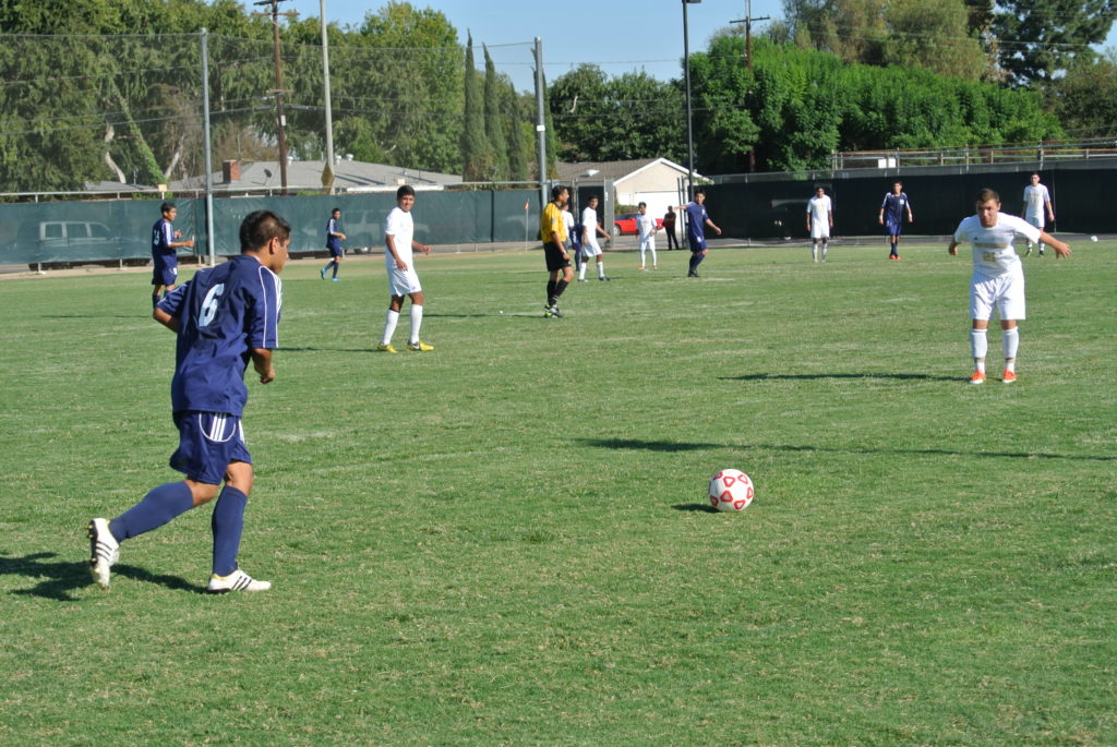 Kennyth Cruz prepares to take a free kick for the Hornets in their 4-2 win over the Southwestern Jaguars.