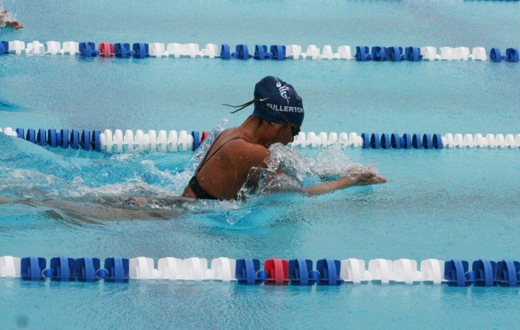Abigail Kuan swims for state championship