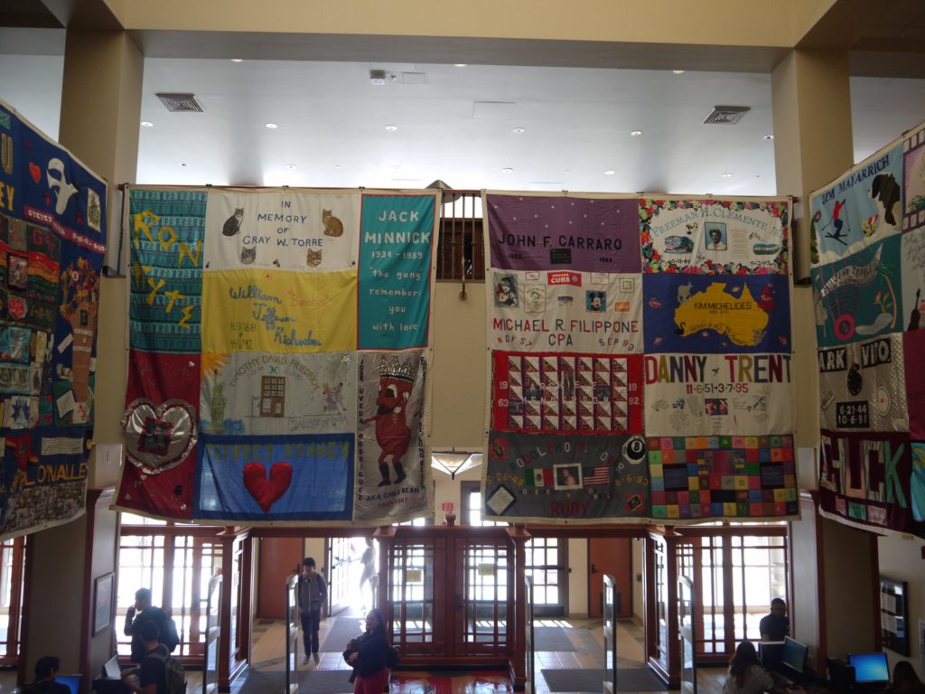 Four panels from the AIDS Memorial Quilt hang in the library Photo credit: Megan Showalter