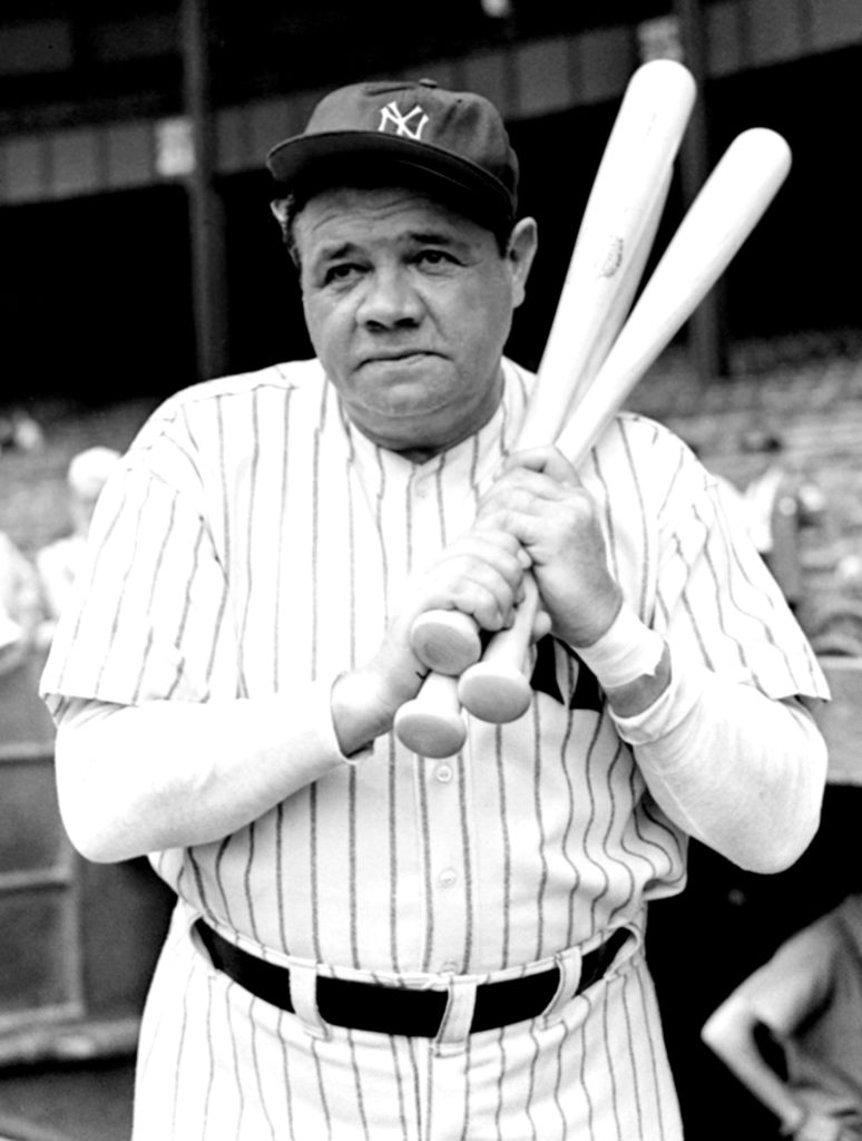 ** FILE ** Retired Yankees slugger Babe Ruth warms up with three bats before stepping to the plate at New Yorks Yankee Stadium, in an August 21, 1942 photo. He was 40, with a pot belly that couldnt be supported by his spindly legs and a growing realization his career was over. His batting average hovered nearly 200 points below his career mark, and his pitchers were unhappy with his inability to run down even the easiest of fly balls. (AP Photo/Tom Sande, file) Photo credit: AP Photo/Tom Sande, file