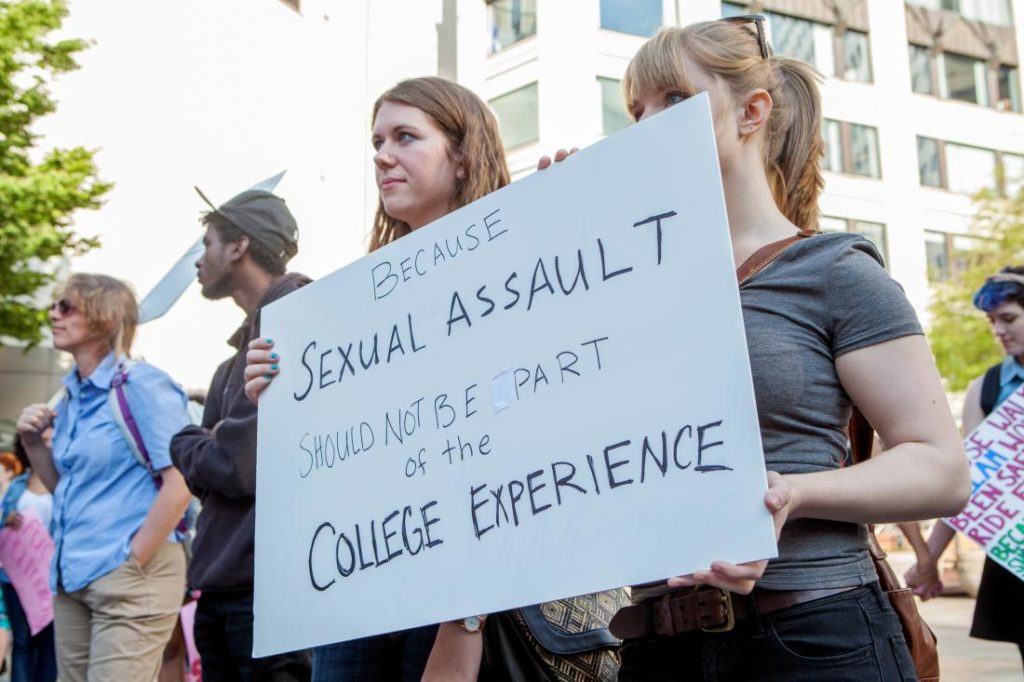 Demonstrators protest sexual assault on college campuses. Image by © Alex Garland/Demotix/Corbis Photo credit: time.com