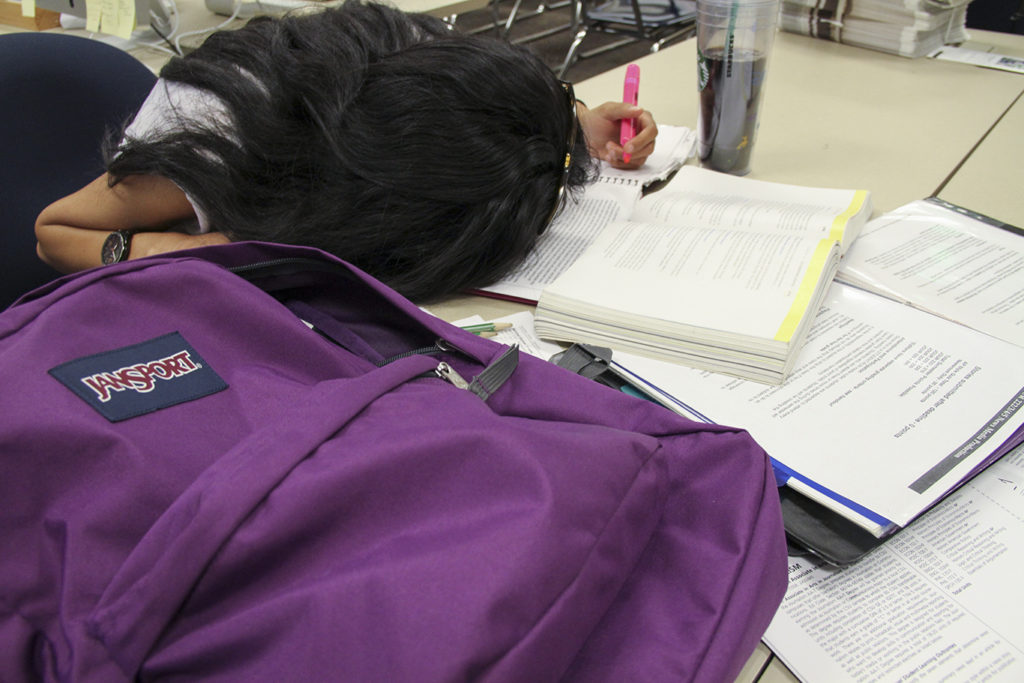 A student crashes while she tries to cram in all the studying she can before finals. Photo credit: Oscar Barajas