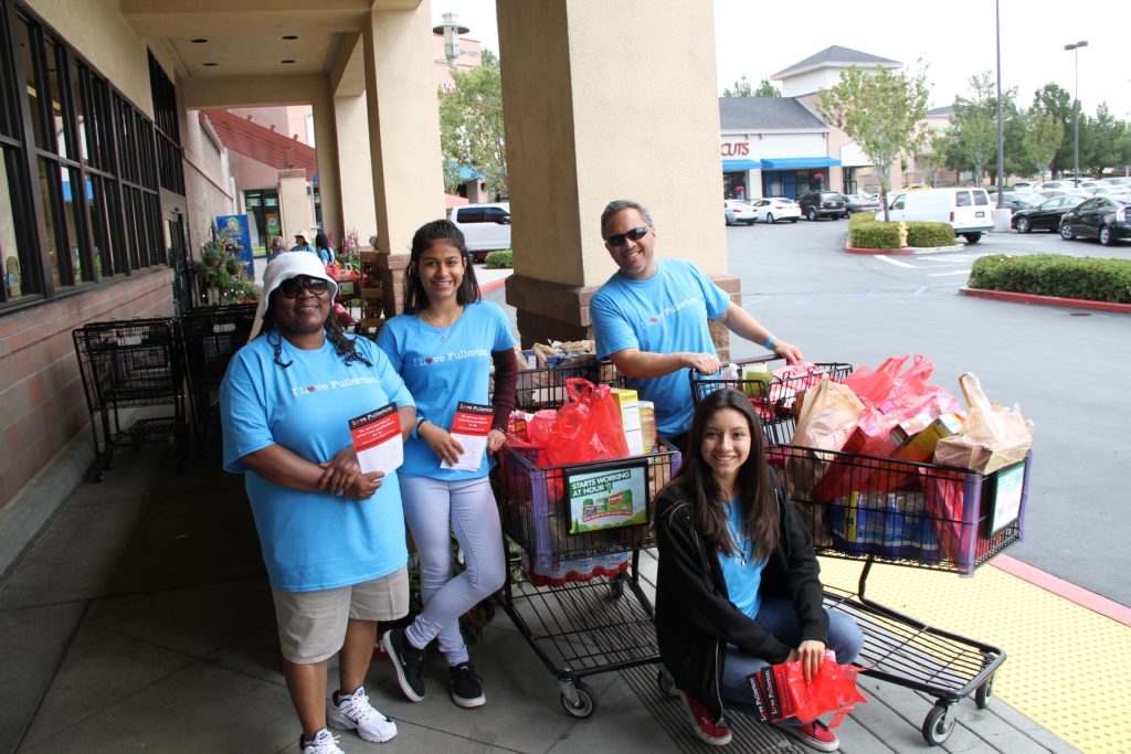 FC Director of Health Services Vanessa Miller, Maya String, Natalia Ivañez and Administer Derek Vergara stand outside Albertsons supermarket collecting donations for the FC Food Bank on Saturday, April 30. Photo credit: Oscar Barajas