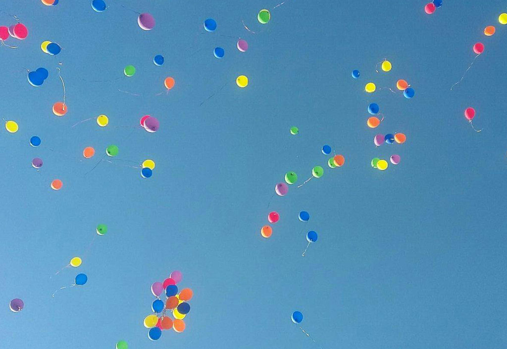 The balloons released in honor of Roger Shew Photo credit: Frank Tristan