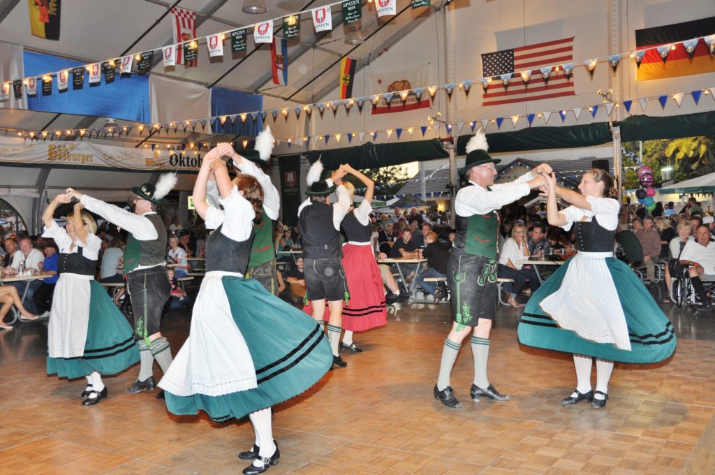 Schuplattler Dancers performing for the crowd during the 2015 Oktoberfest. Photo credit: Dave Clark Photography
