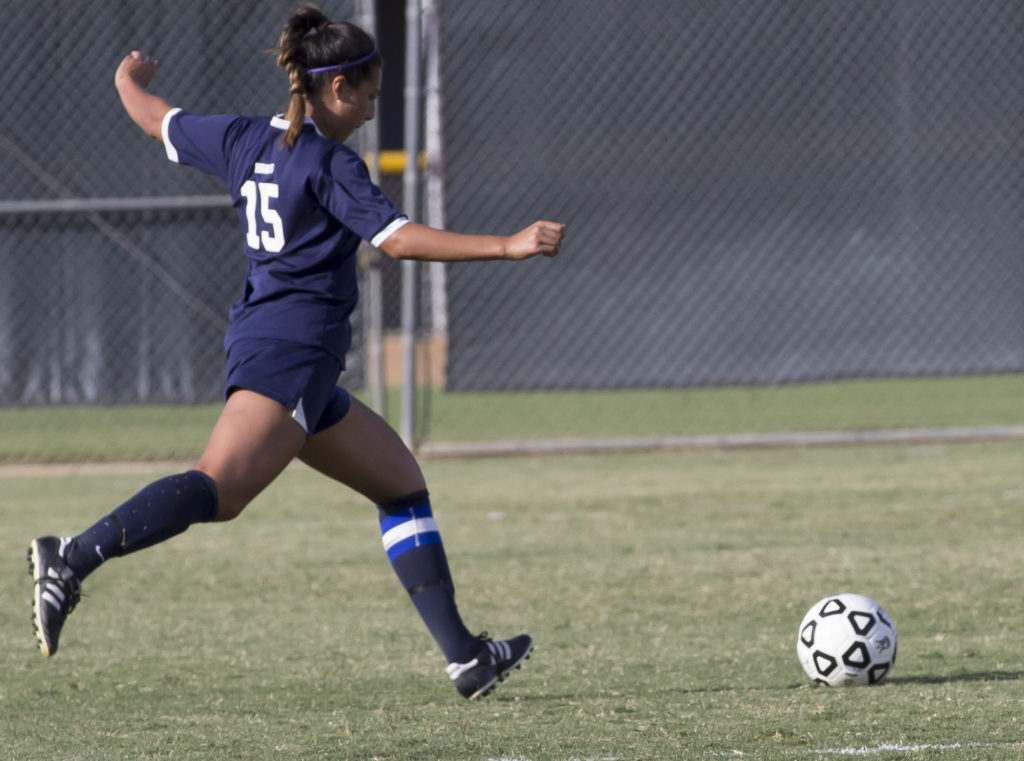 Irene Jimenez #15, takes a free kick in attempts to get a goal against Golden West Photo credit: Christian Mesaros