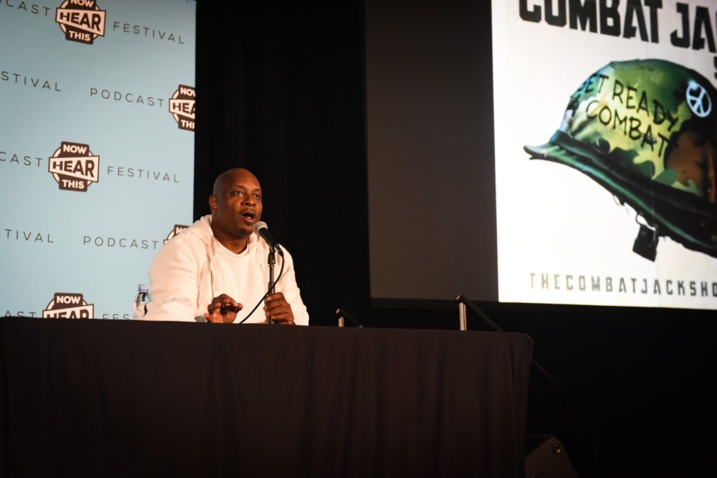 Reggie Combat Jack Osse answers questions from his fans at the Now Hear This Podcast Festival. Photo credit: Carly Otness