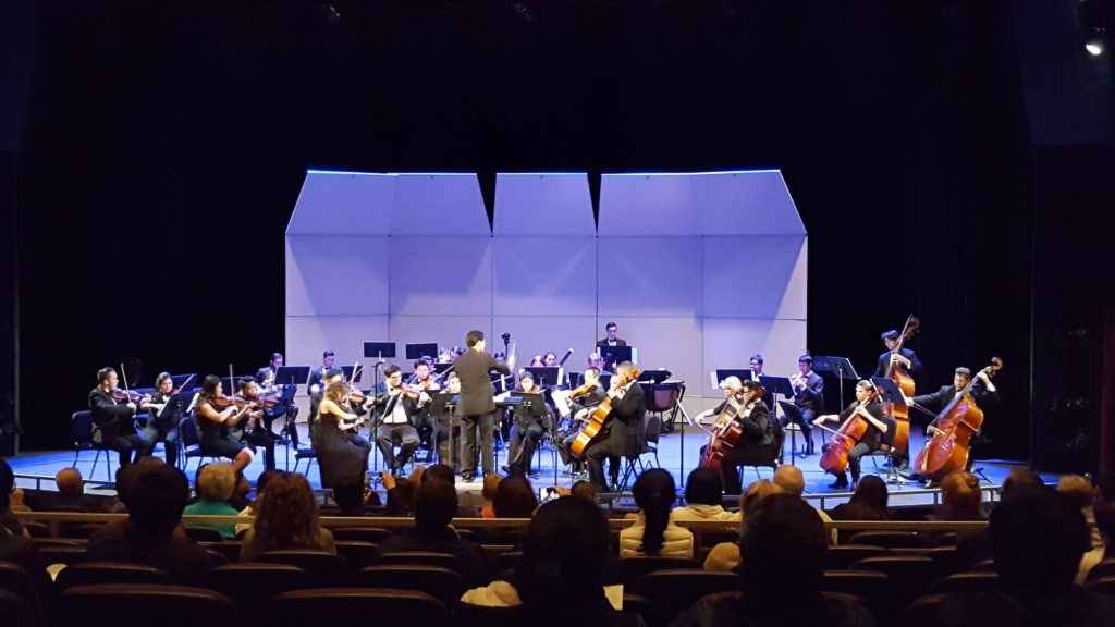 Zun-Hin Woo conducts the Fullerton College Symphony during their performance on Monday, Nov. 21 at the FC Campus Theatre. Photo credit: Valerie Vera