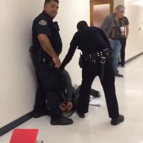 Campus Safety officers depicted in videos can be seen placing Lorenzo Bennett, 30, in handcuffs during their interaction. Photo credit: anonymous