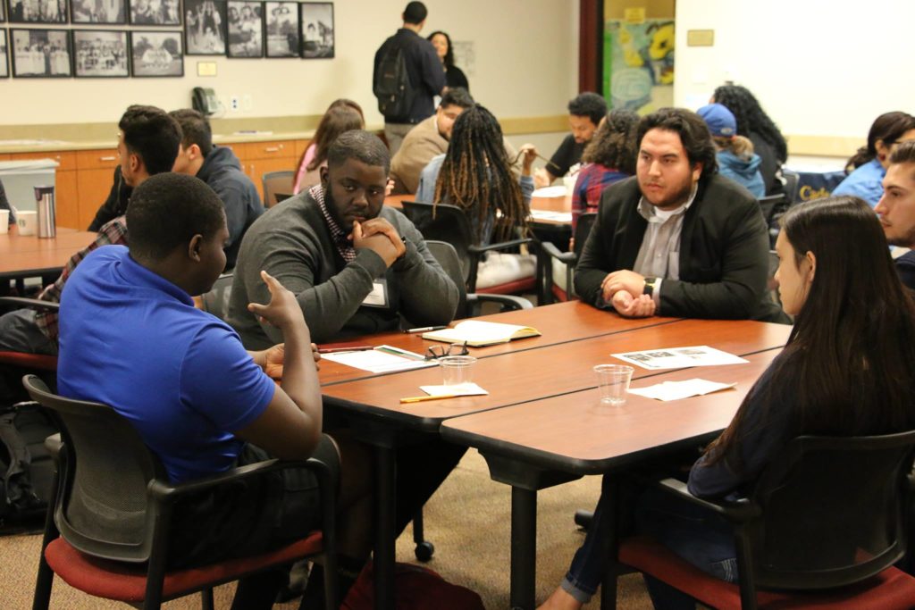 Students engage in discussion and share their stories with one another Photo credit: Hector Arzola