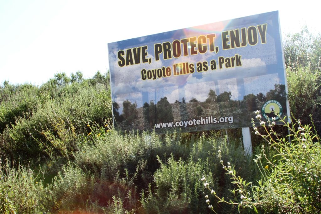 Sign placed near the Robert E. Ward Nature Preserve asks for help to preserve West Coyote Hills Photo credit: Aaron Untiveros