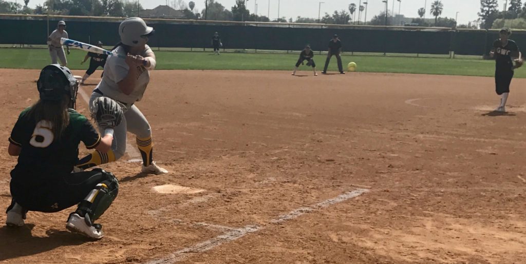 A Lady Hornet about to swing for a base hit against Golden West College. Photo credit: Rebecca Radtke