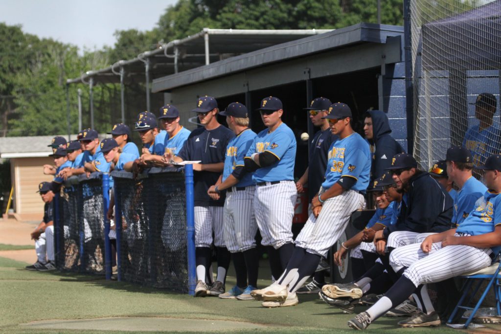 The team in the dugout watching their offense during Thursdays loss. Photo credit: Stephanie Lozano