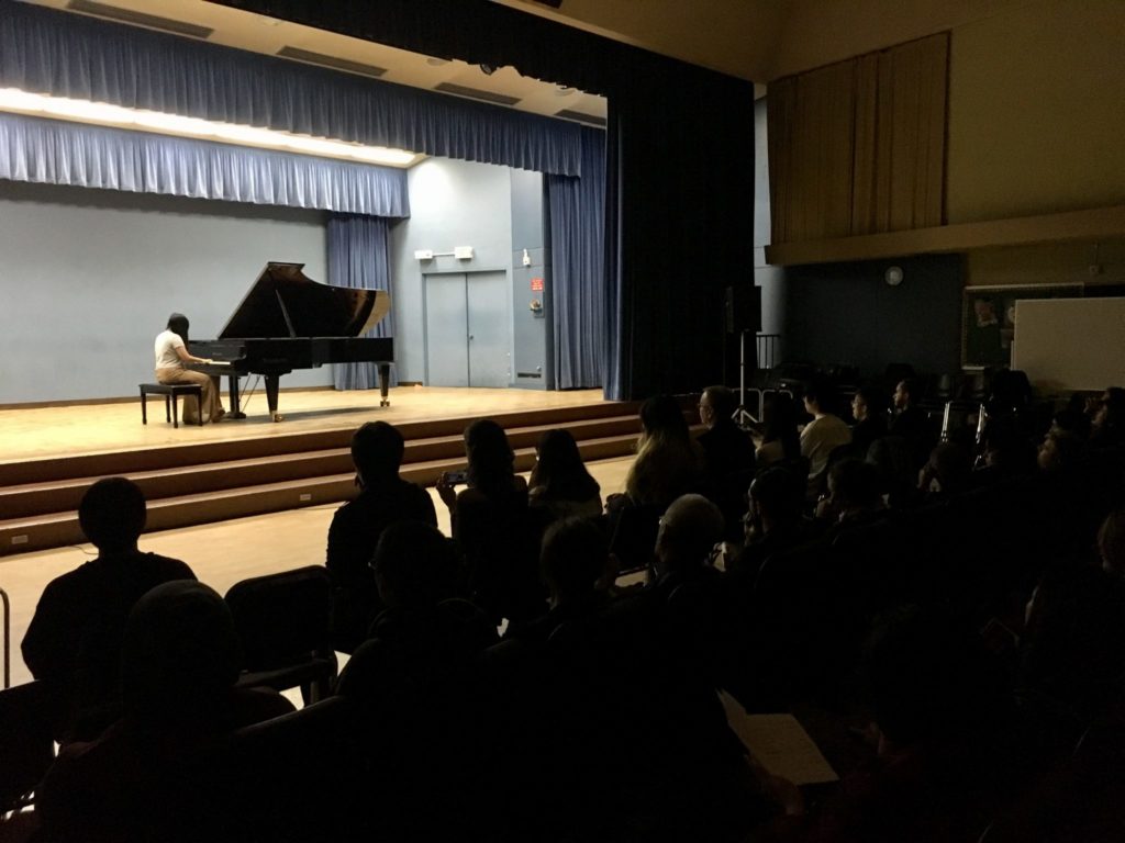 The audience in full focus during students performances during the Applied Piano Recital Photo credit: Katie Brown