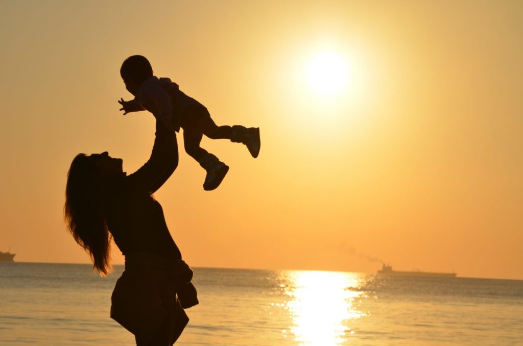 Mother and child silhouette during sunrise Photo credit: Pexels