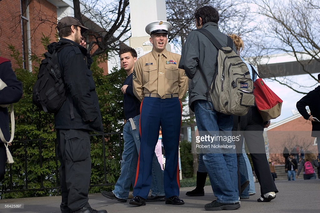 A marine recruiter talks to students Photo credit: Getty Images