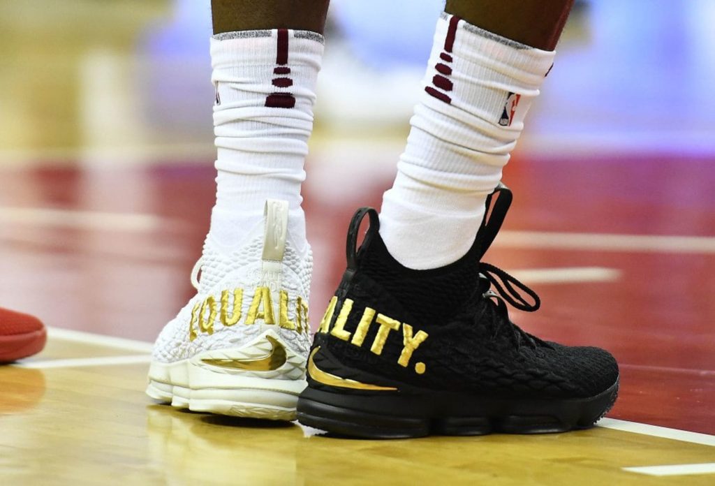 Lebron James wearing customized Nikes to promote awareness of the social issues going on in the USA. Photo credit: Courtesy of USA Today