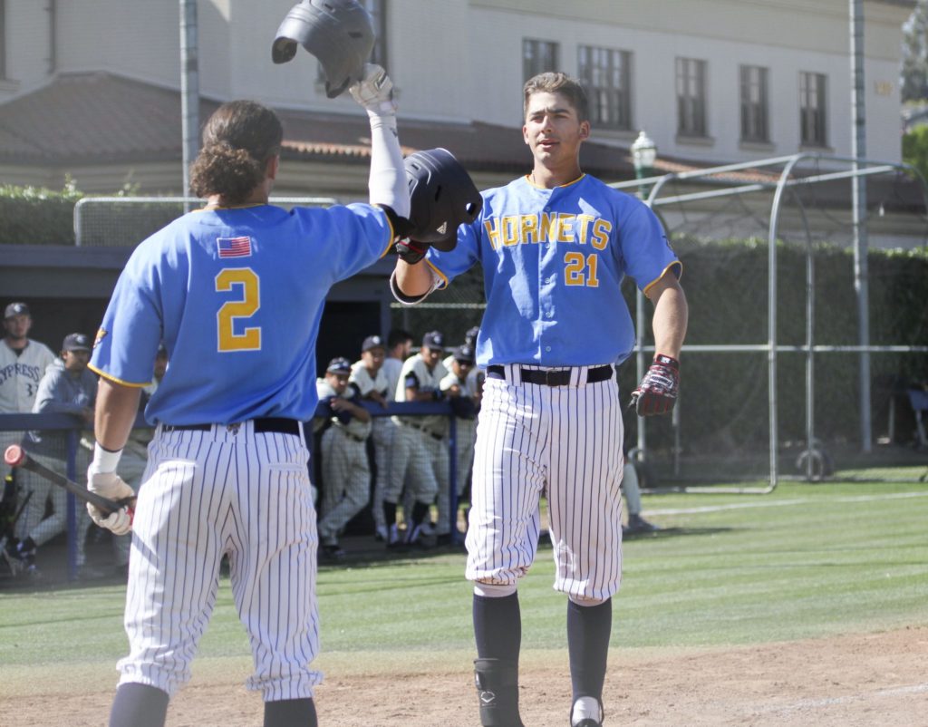Hornets Chase Kerr celebrating his home run in the top of the eighth inning with Thomas Delgadillo on April 24. Photo credit: Ciera Chavez