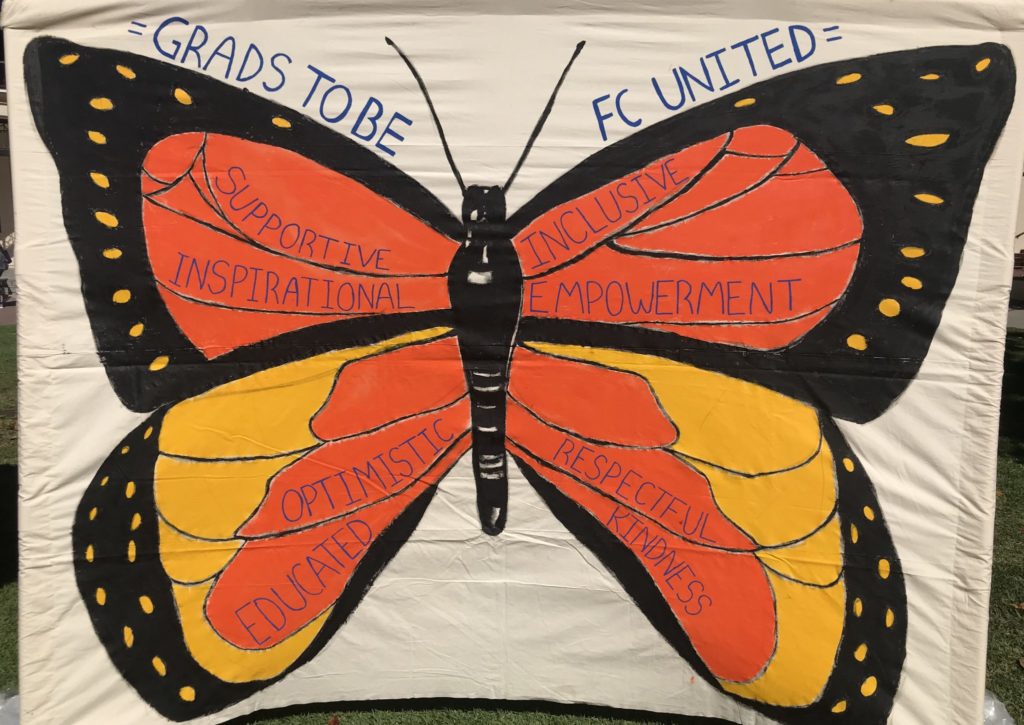 Grads To Be program is hosting a week of events in honor of Undocumented Students Week of Action. Here their Butterfly Banner hangs for the Resource Fair they hosted on Tuesday afternoon. Photo credit: Valerie Sandoval