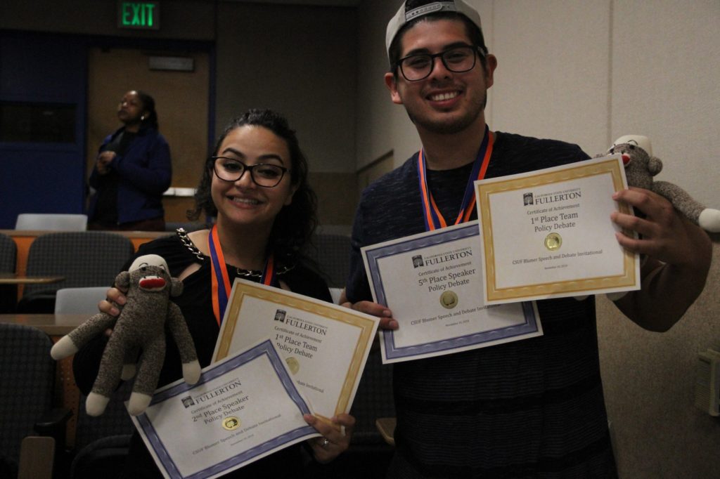 Fullerton Colleges Daniel Herrera Garcia and Gitty Shah received awards for placing first place in policy debate. Photo credit: Blake Ward