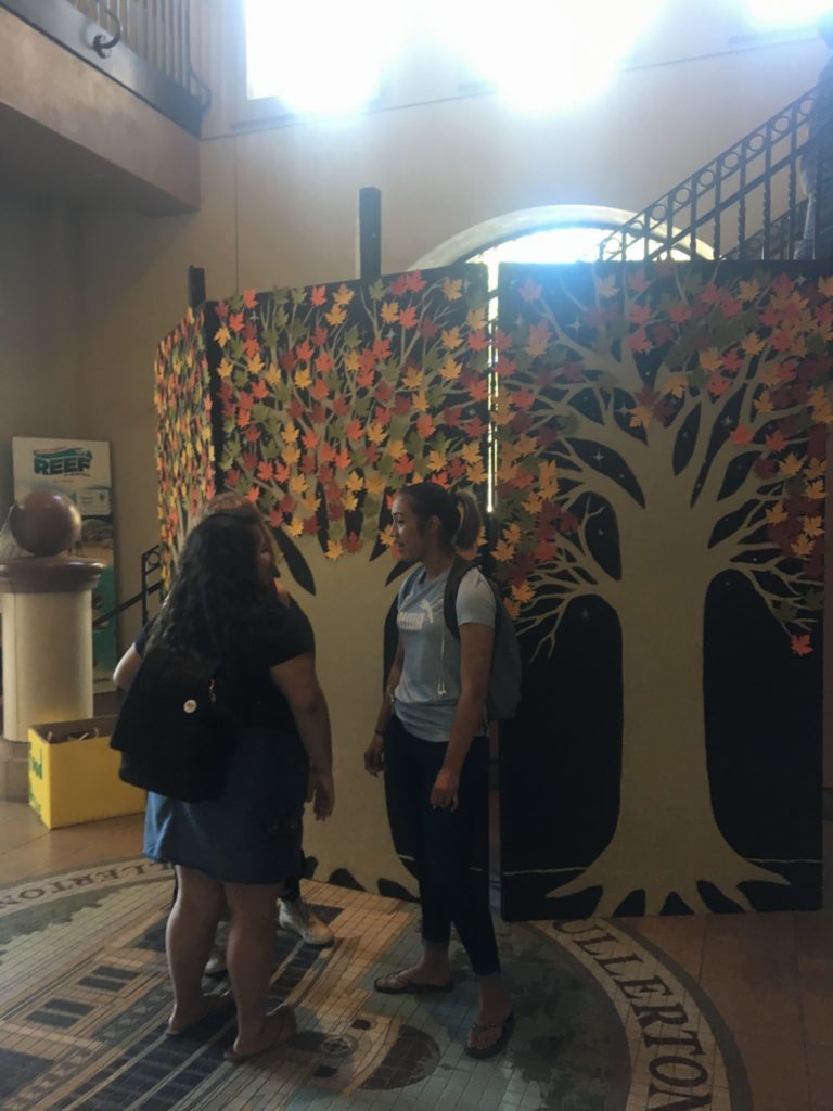 Students view the display inside the 200 building. Photo credit: Myah Phillips