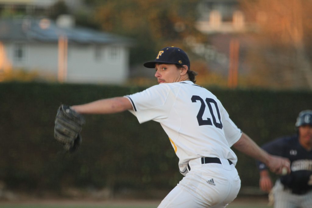 Hornet sophomore pitcher Patrick Showalter pitches a shutout 9th inning to end the game against Cerritos on Tuesday, Feb 19.