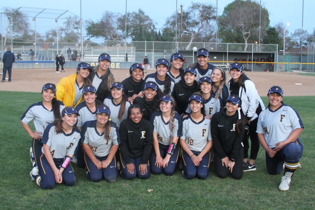 Hornet softball players pose after being victorious in both of their games against Long Beach & Santa Barbara on Saturday, Feb. 23. Photo credit: Bovie Lavong