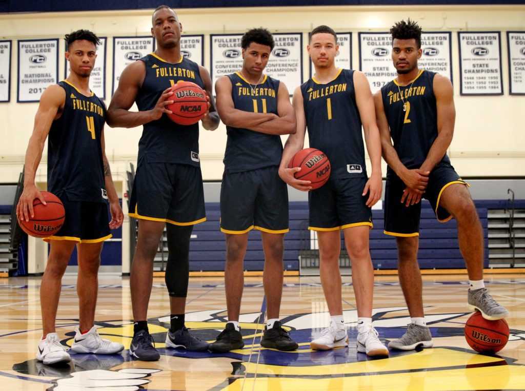 Hornet players Dylan Banks, Ronne Readus, Rodrick McCobb, Lance Coleman II, and Omajae Smith pose after practice on Tuesday, Feb. 26. Photo credit: Ciera Chavez