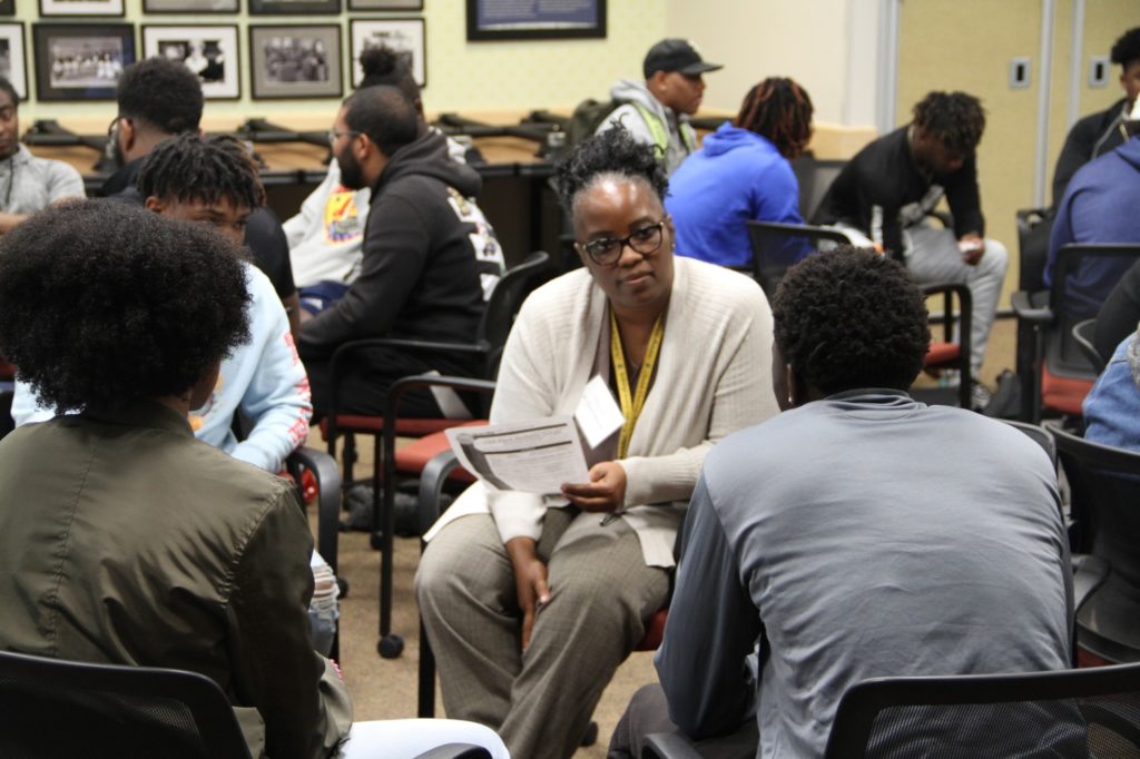 Students talk about topics discussed with faculty members in small groups at the Black Student Forum &Social. Photo credit: Blake Ward