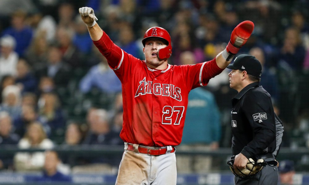 May 5, 2018; Seattle, WA, USA; Los Angeles Angels center fielder Mike Trout (27) reacts after scoring a run against the Seattle Mariners during the eleventh inning at Safeco Field. Photo credit: USA Today & Joe Nicholson