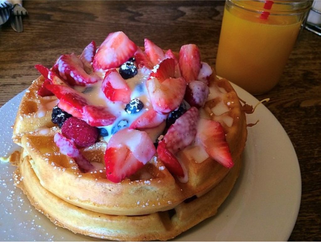 The Berries & Creme Waffles were fluffy and scrumptious at Monkey Business Cafe. Photo credit: Edith Verduzco