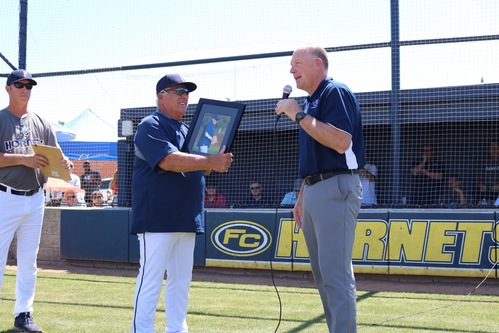 Fullerton Head Coach Nick Fuscardo is honored by FC Athletic Director Scott Giles for his 33 years of service as the Hornets skipper on Thursday, Apr. 25. Photo credit: Fullerton College Administration