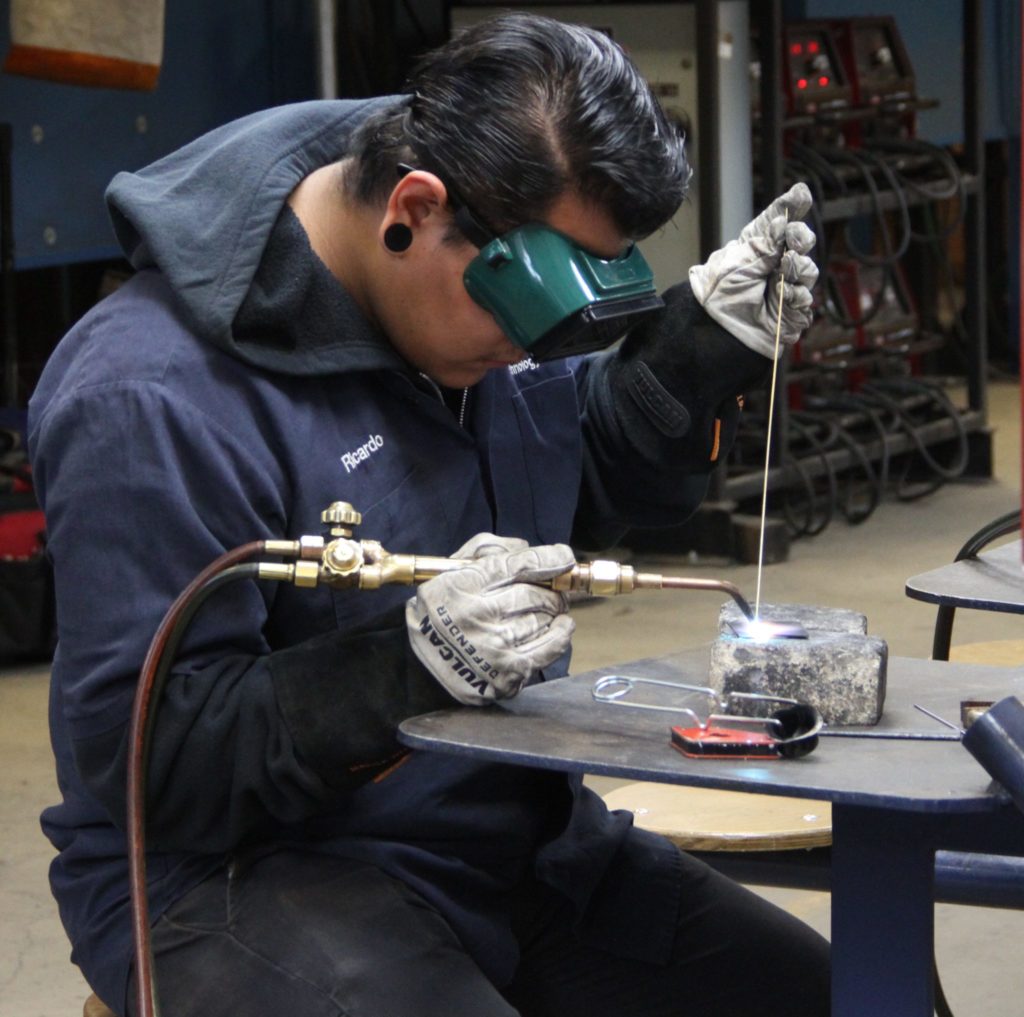 FC student practices their welding skill with equipment during class on April 9, 2019. Photo credit: Maureen Grimaldo