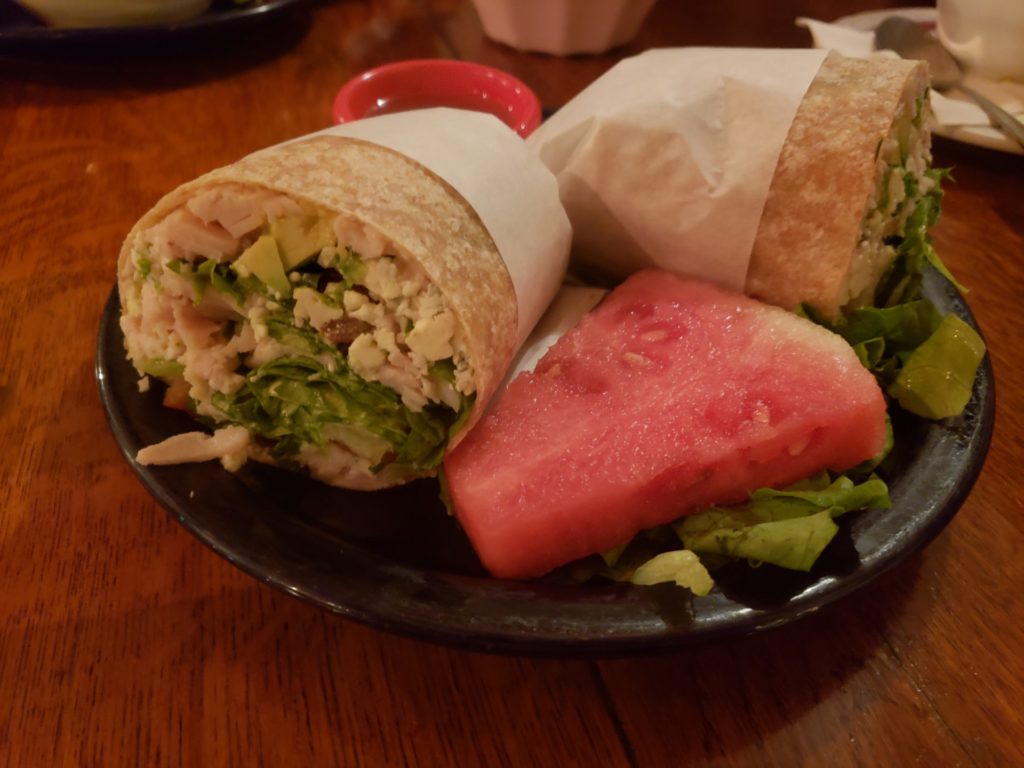 Turkey Avocado Wrap served watermelon and mediterranean dressing. Photo credit: Ann Lipot