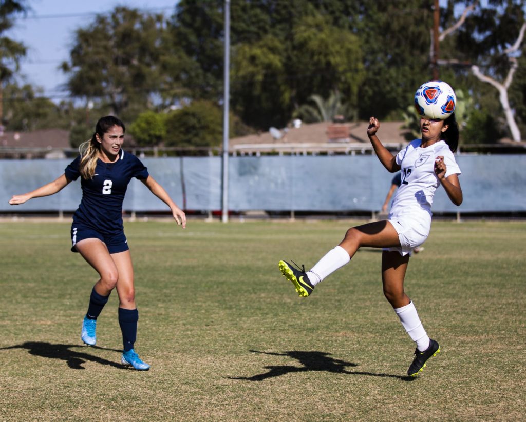 Audrey Ochoa waits for the ball to hit the ground as Irvines strategy was to keep it in the air. Photo credit: Adam Aranda