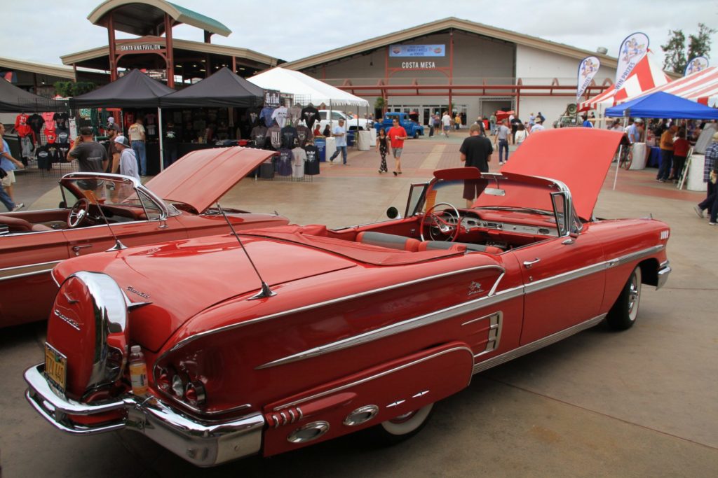 A 1958 Chevrolet impala sits in front of the more than 200 vending booths and exhibits in the OC Fair and Event Center Photo credit: Gabe Larson