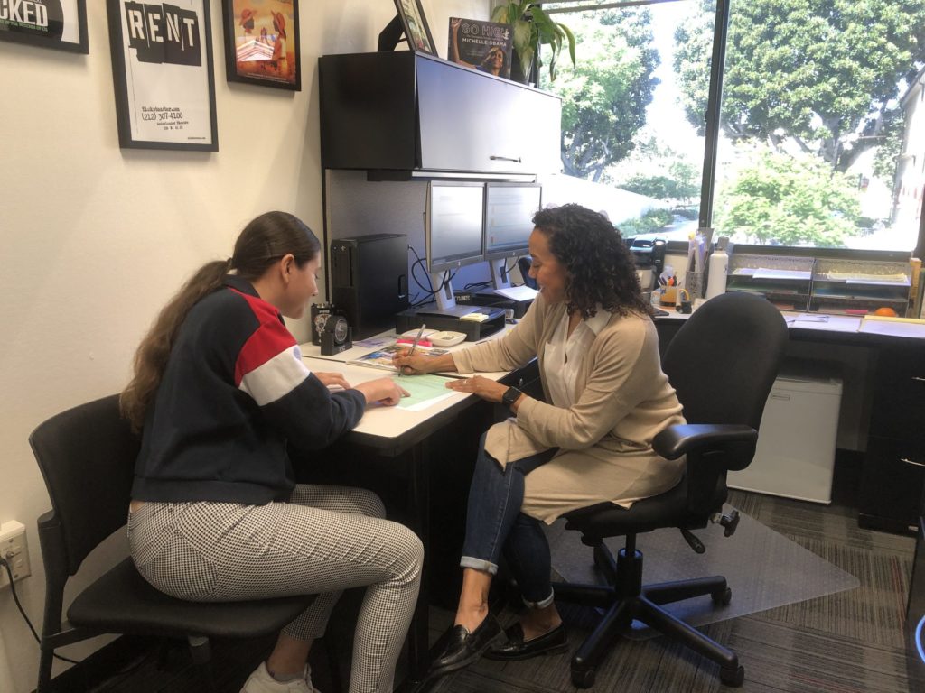 FC student reviewing transfer requirements with academic counselor, Linda Kelly-Mandich.