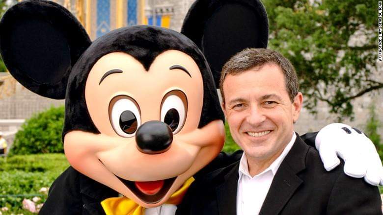 Bob Iger posing for a picture with his boss, Mickey Mouse Photo credit: disney