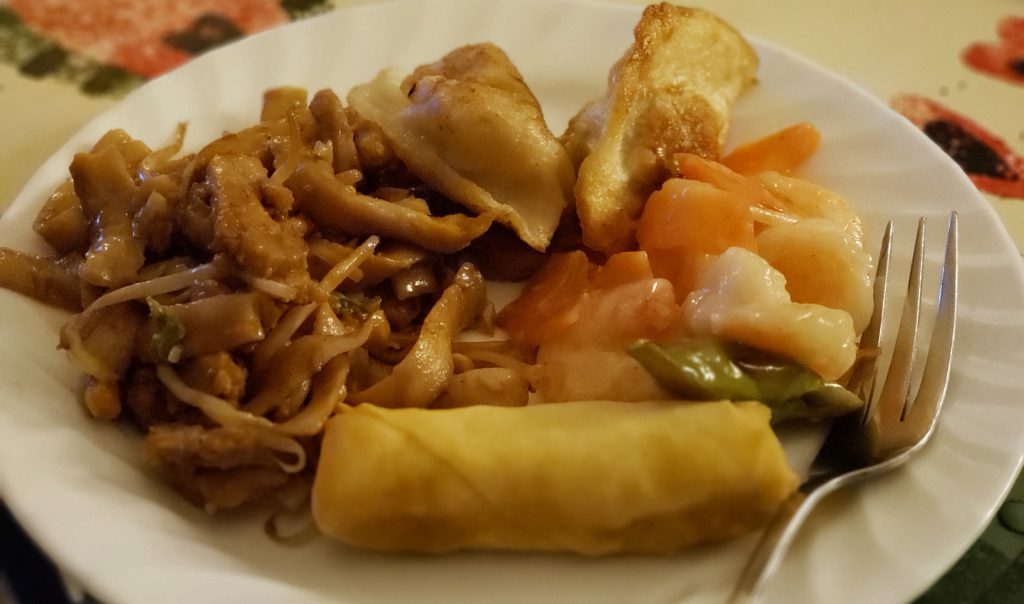 A full plate of choices from Mas House Halal. Egg roll, pan-fried beef dumpling, chicken dough sliced chow mein and shrimp with asparagus. Photo credit: Ann Lipot
