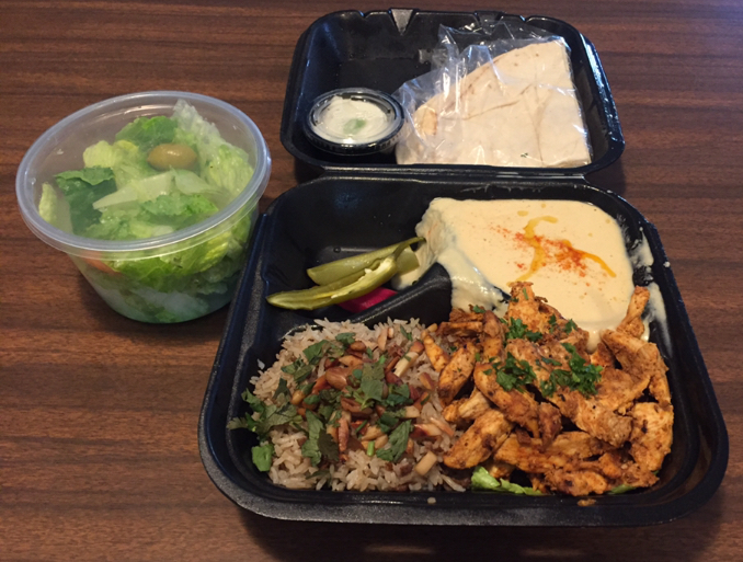 Shawerma Style Chicken: marinated strips, hot pita, hummus, house salad, garlic spread, and the house rice. Another popular entry in the Platter section of the menu. Photo credit: Joe Trujillo