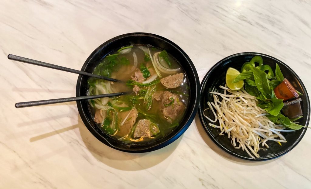 The Chef Special Beef Pho has prime brisket, meatballs, filet mignon and oxtail. Every bowl comes with a side of bean sprouts, basil, jalapenos and lime. Photo credit: Joshua Jurado