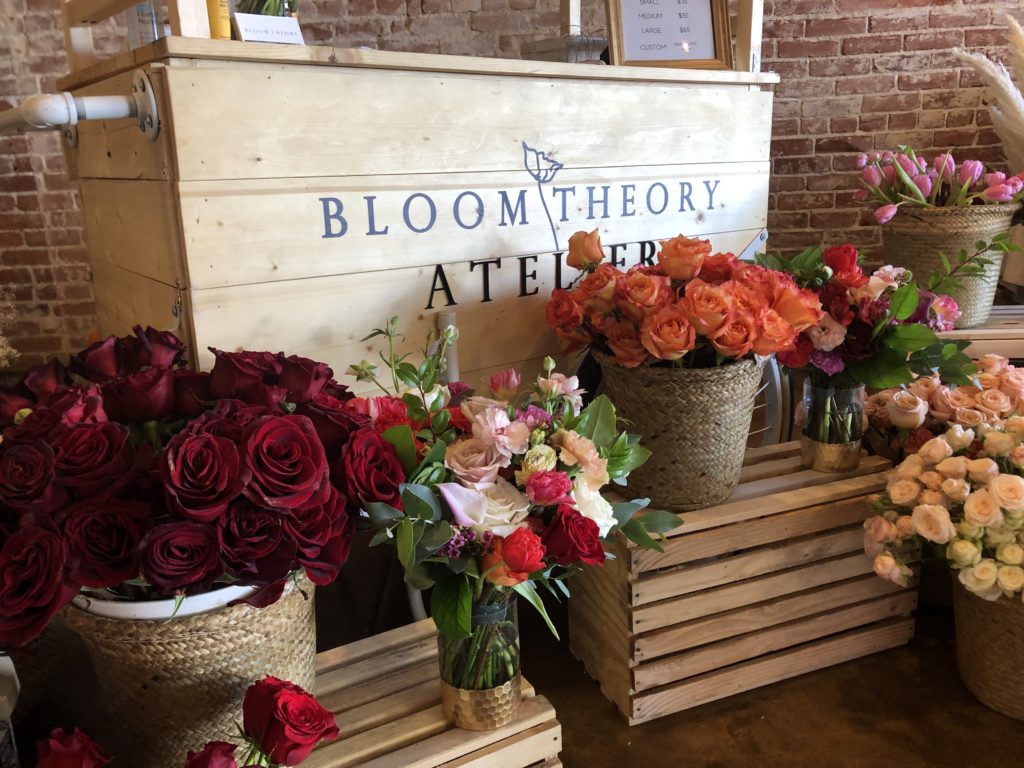 Bloom Theory displayed their floral arrangements alongside their logo at the pop-up. Photo credit: Blare Parke