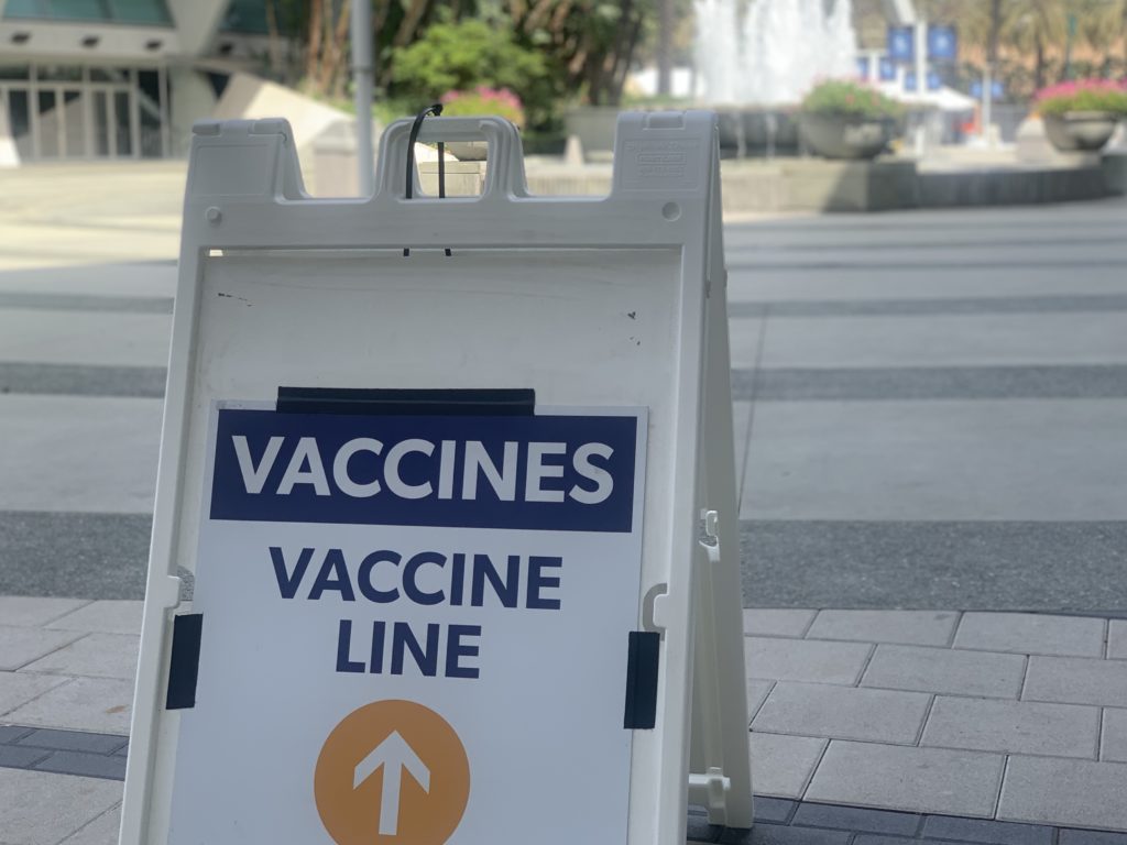The Anaheim Convention Center is one of the vaccine super PODs that Orange County has open to the public. These PODs offer both Pfizer and Moderna vaccines depending on availability. Photo credit: Myron Caringal