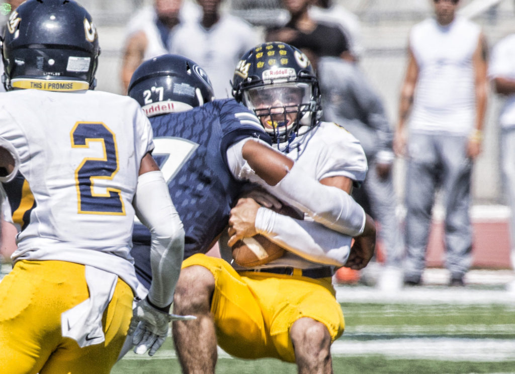 9/18/21: Football action, Canyon College at Fullerton College. Photo credit: Jim McCormack