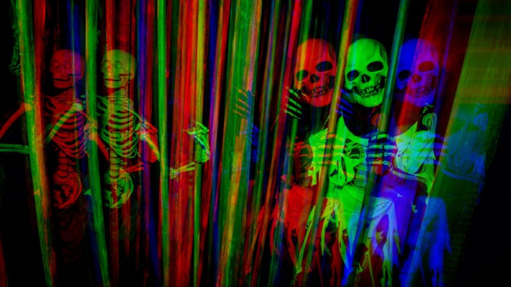 A glitchy multi-dimensional tri-colored skeleton inside one of the seven different mazes, not including the Terror Tram at Universal Studios Hollywood Horror Nights. Photo credit: Nicole Melanie Freerks