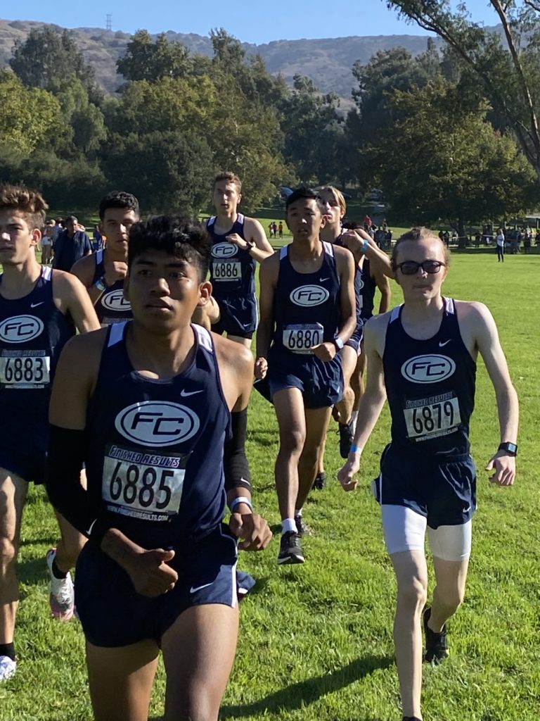Cyrus Burton and the Hornets are ready to race (Cyrus Burton is number 6879). Photo credit: Gina Bevec Cross-Country Coach