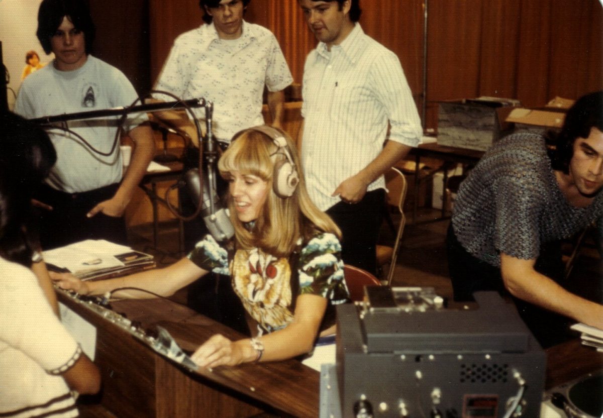 Fullerton College student Diana Kirchen, who later became a full-time instructor in the radio program, does a live remote broadcast along with Jim Hilliker and Bob Wood at the Anaheim Convention Center in March 1976. Courtesy of Diana (Kirchen) Kelly.