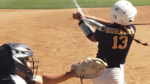 Fullerton College second baseman Alendy Aguilar swinging at a pitch during Wednesdays game that ended with a loss at home; final score 8-1 Cypress College. Photo credit: Gerardo Chagolla